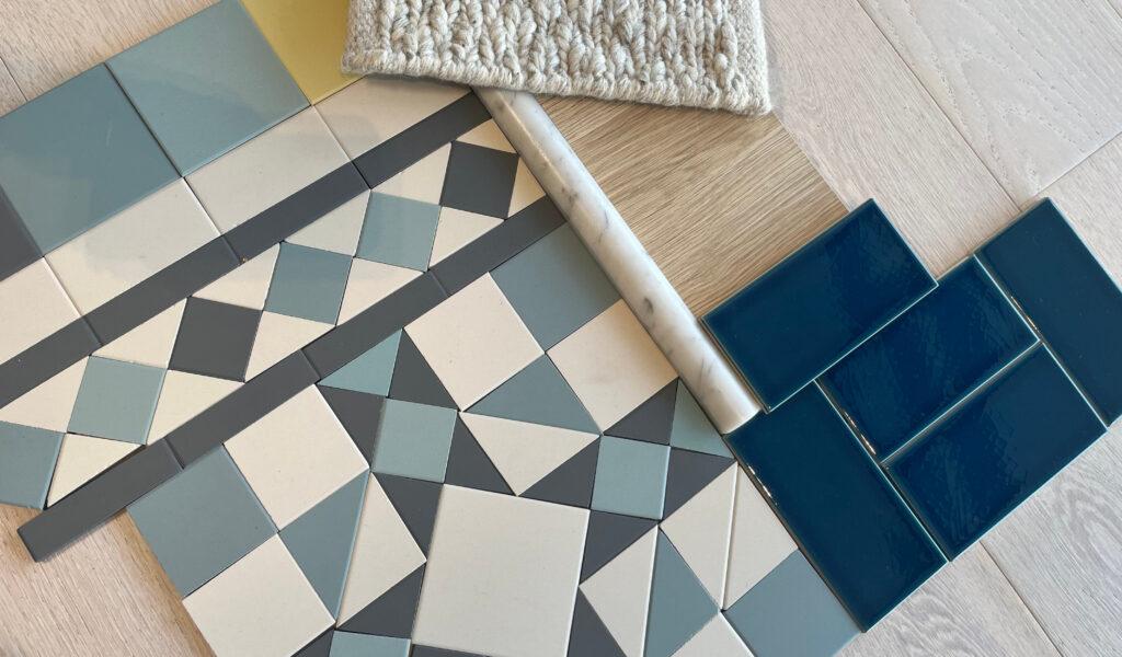 Installer laying large-format floor tiles